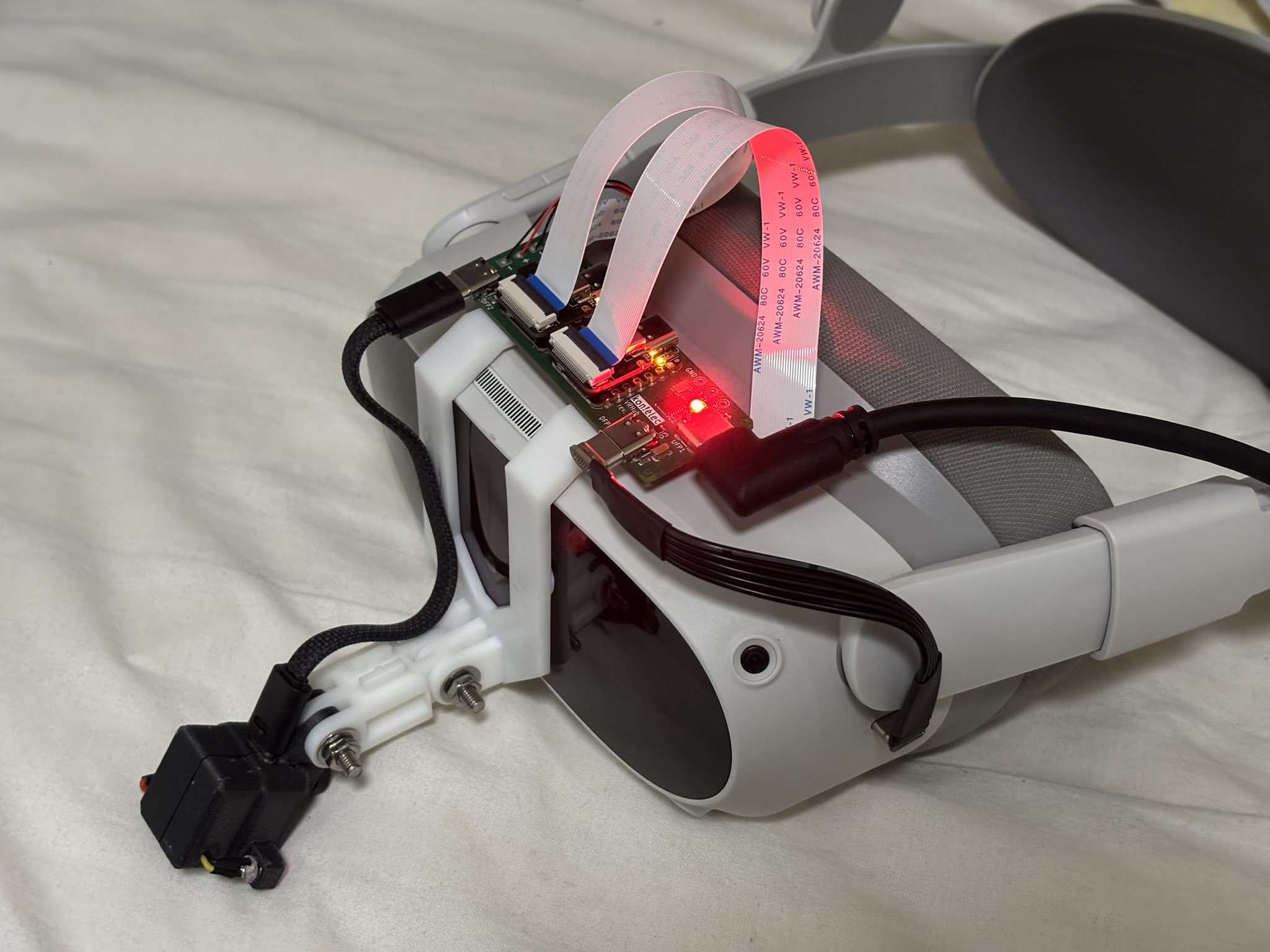 Photo of VRHub rev. 2 attached to a Pico 4 headset